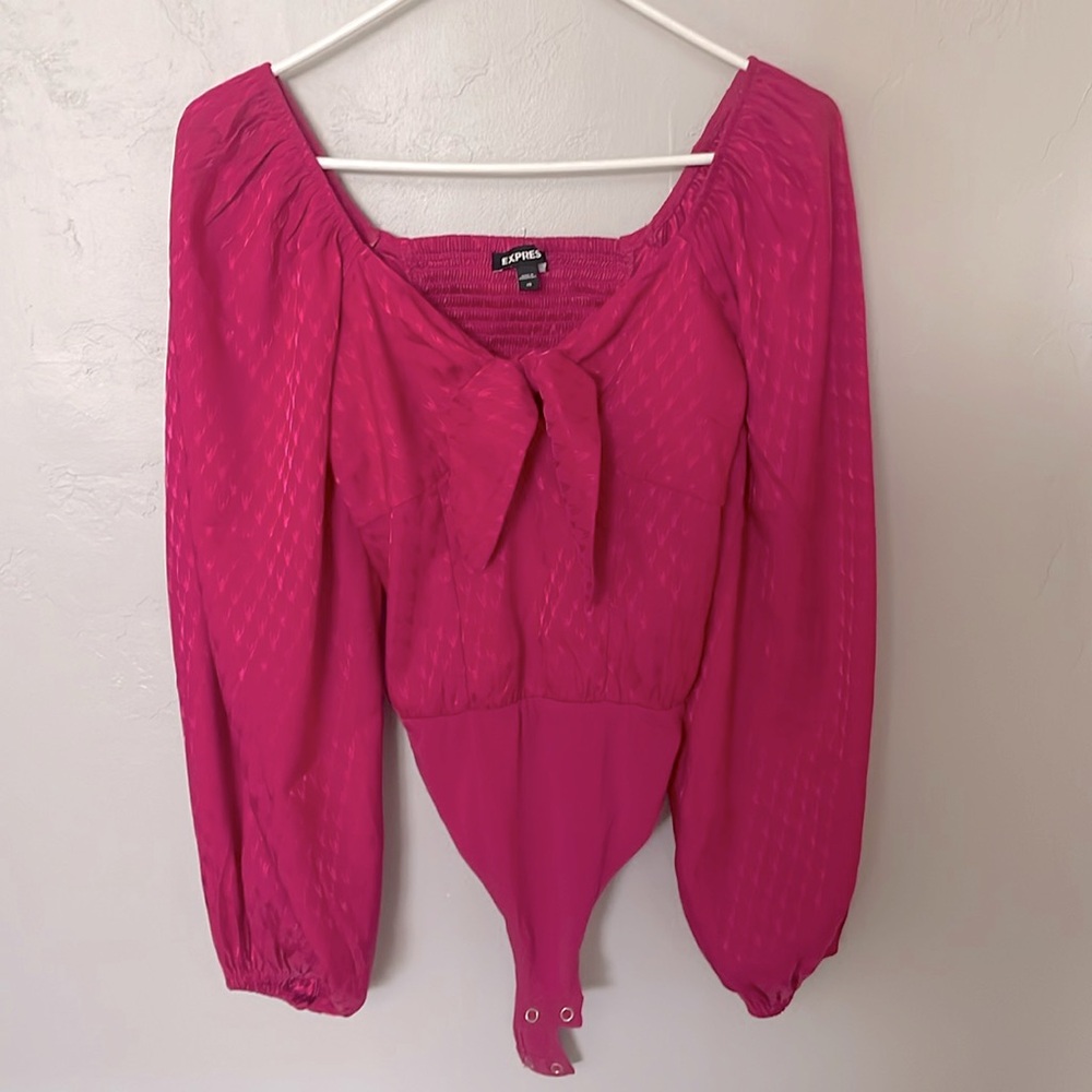 Women’s Express XS pink bodysuit.